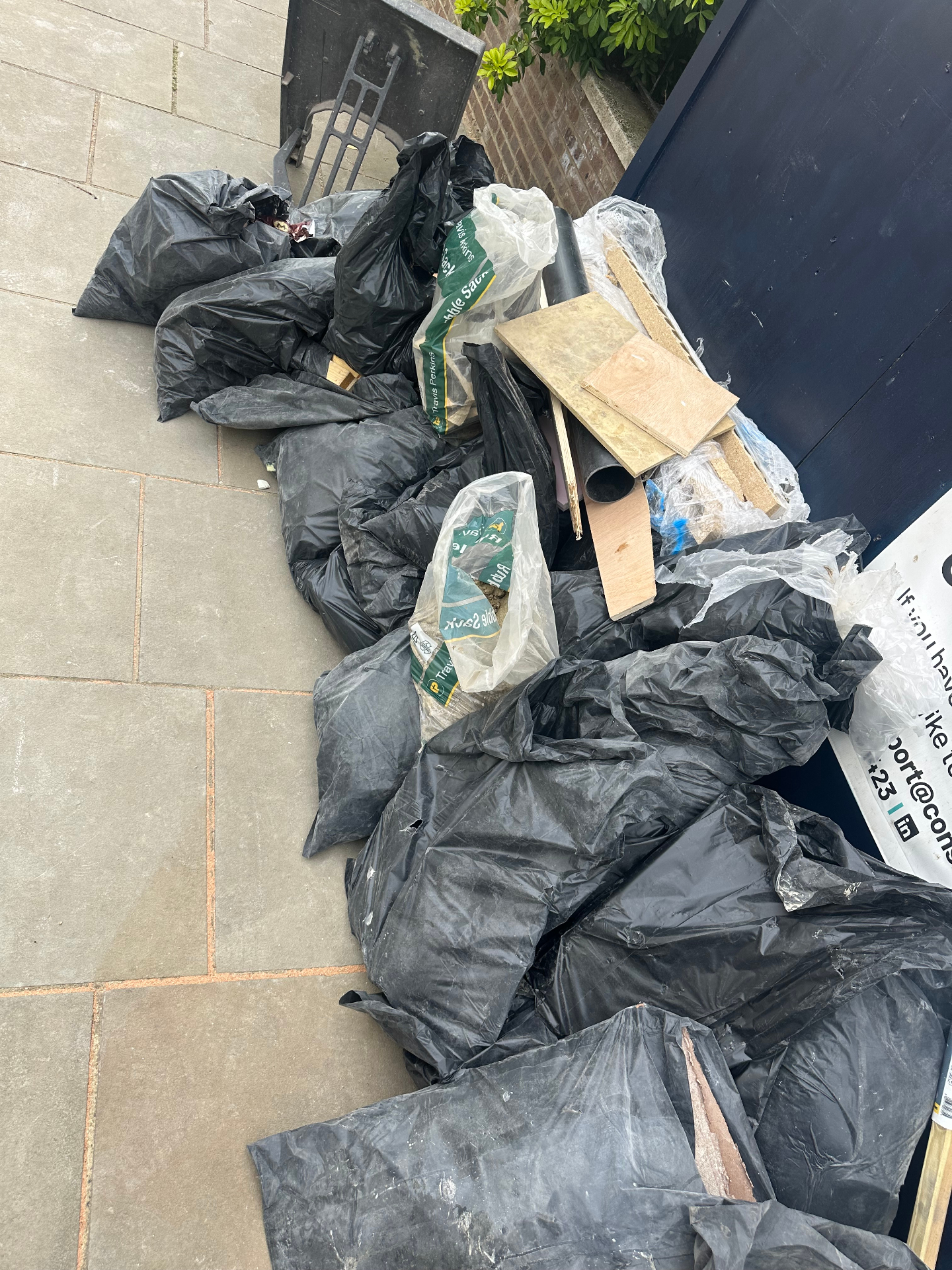 Black bags of household rubbish collected